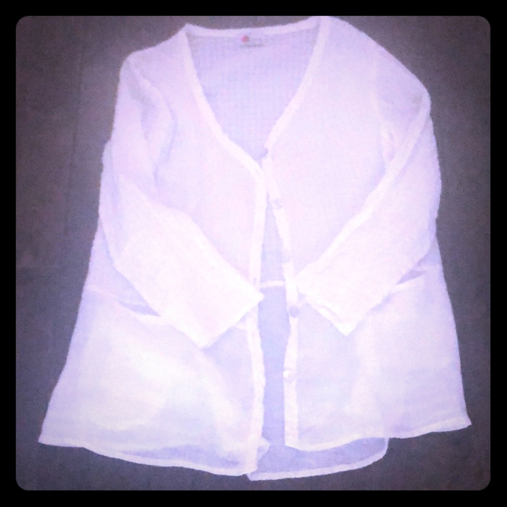 White linen flowy jacket.